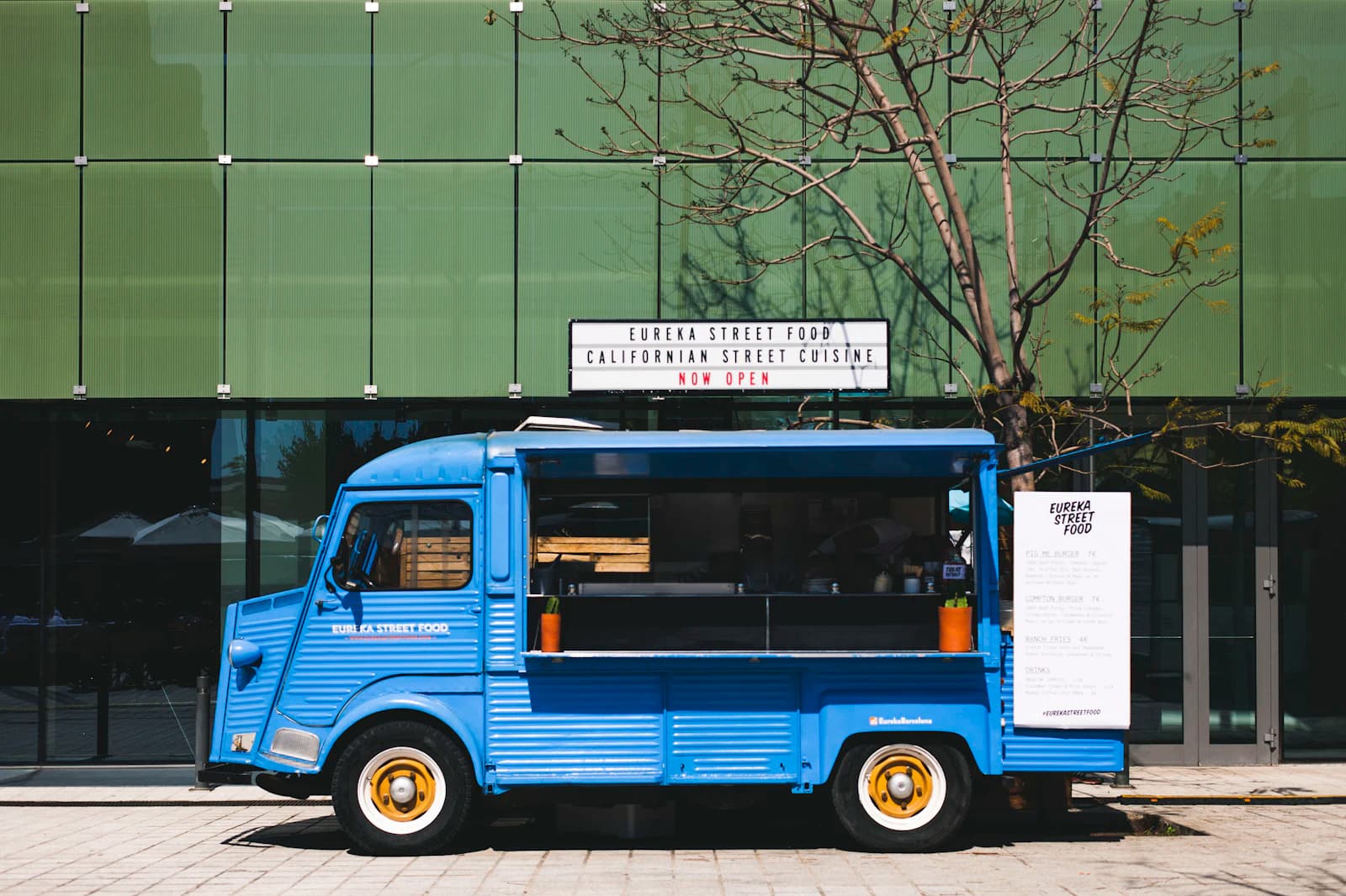 Food truck serving customers at night